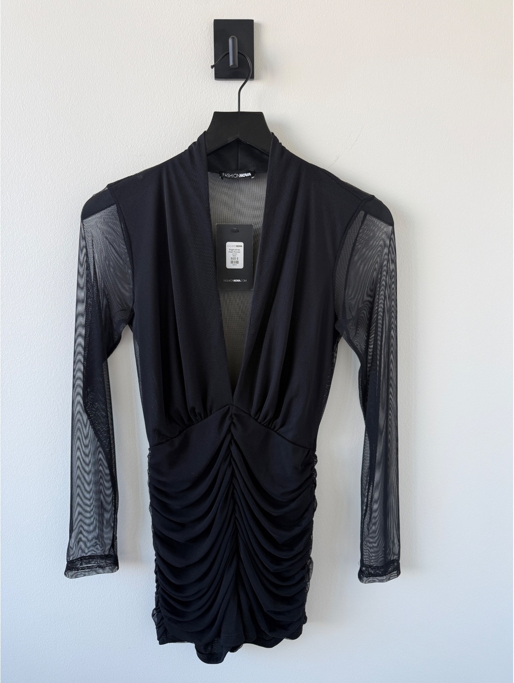 Fashion Nova Black Sheer Mesh Long Sleeve Ruched Romper with Deep V-Neck